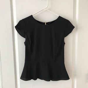 Express black silky peplum top.